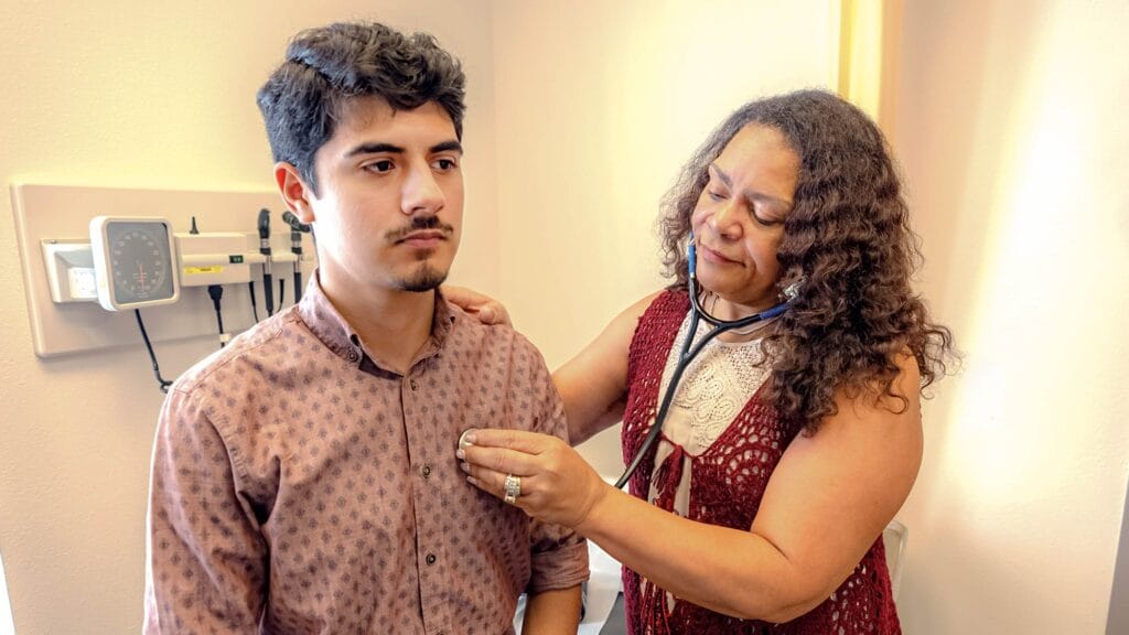 Men's Health Services at Community Health Centers of South Central Texas - Male patient with nurse