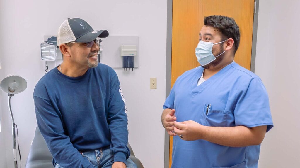 Nurse with Patient in Exam Room Diabetes management and diagnosis at Community Health Centers of South Central Texas