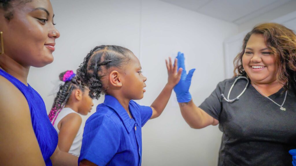 Pediatric Nurse with Patient in Elgin Clinic