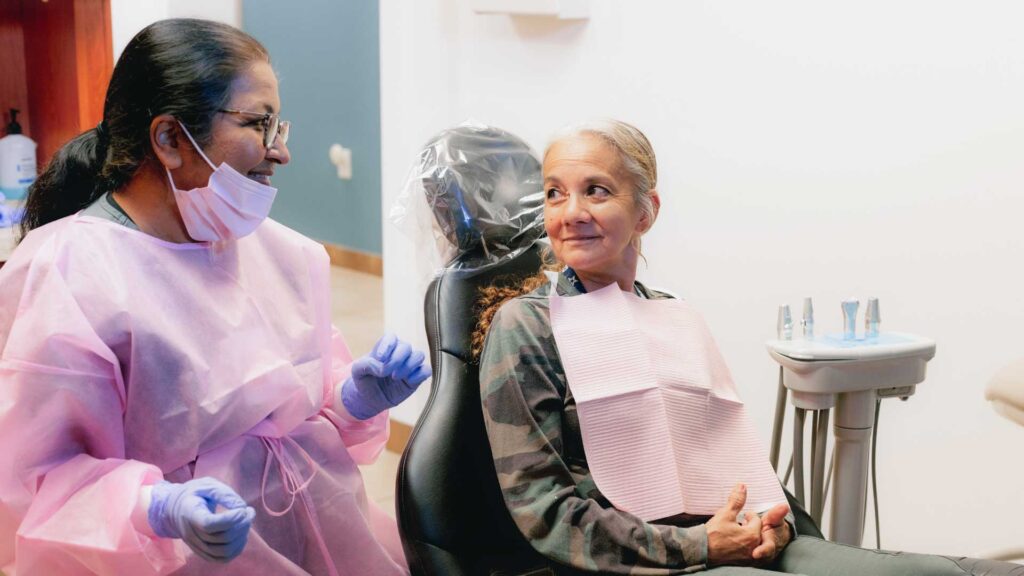 Dr. Yashashri Urankar, dentist with patient