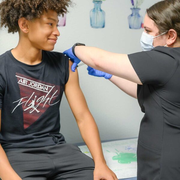 Nurse Making Injection of Vaccine Vaccines and Labs