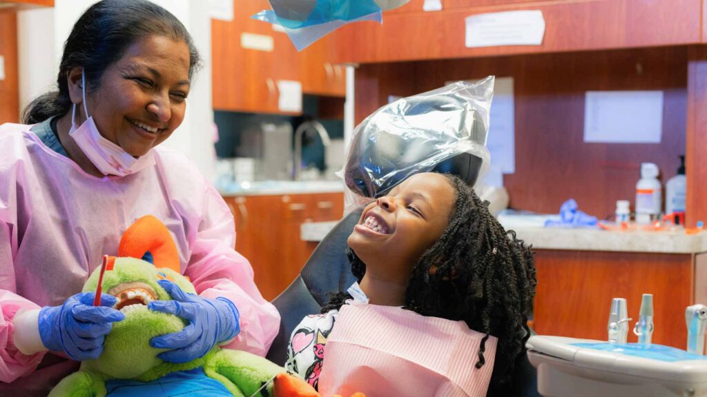 Dr. Yashashri Urankar, dentist with pediatric patient