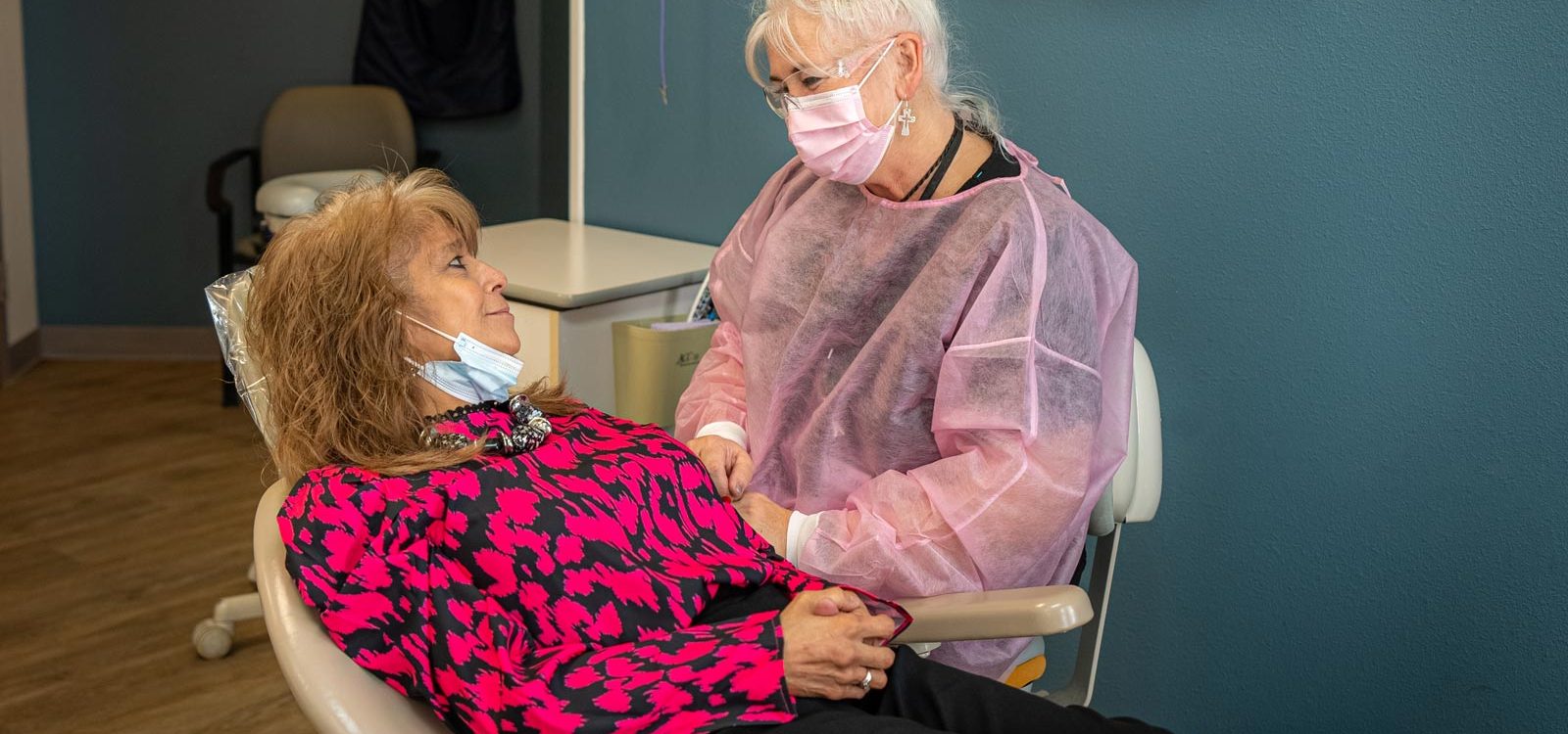 CHCSCT Careers_Dental Assistant. Photo of female dental assistant and patient.